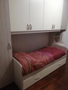 Letto o letti in una camera di Sulle orme di Francesco appartamento verde