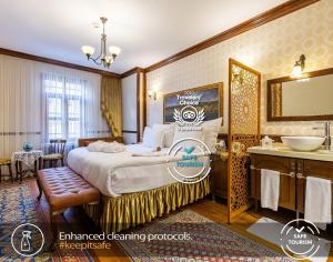 a hotel room with a large bed and a large window at Best Point Hotel Old City - Best Group Hotels in Istanbul