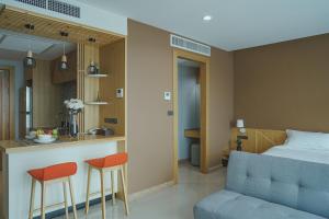 Posezení v ubytování The Cotton Tree Hometel + 27 fotografií