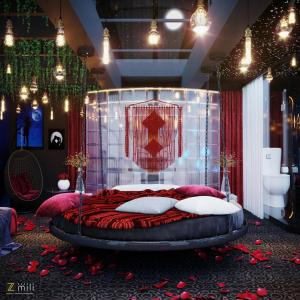 下龍灣的住宿－Zen Hotel Hạ Long，一间卧室配有一张带红色枕头的大床