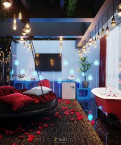Zimmer mit einem Bett und Rosen auf dem Boden in der Unterkunft Zen Hotel Hạ Long in Hạ Long