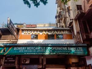 a building with a sign that reads bourbonhyde mercantile cooperative banking lab at Hotel Al Fatah in Mumbai