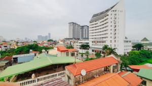 an overhead view of a city with buildings at Sunstay Paradise in Hanoi