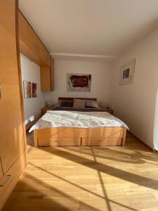 Posteľ alebo postele v izbe v ubytovaní Modernes Alpenapartment mit Sauna Wintergarten und Pool