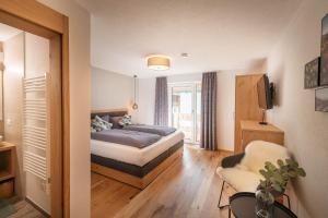 Posteľ alebo postele v izbe v ubytovaní Appartements Seven Summits