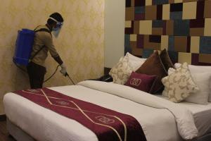 Postel nebo postele na pokoji v ubytování Hotel Taj Princess - Boutique Hotel