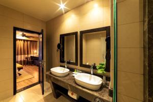 Vannituba majutusasutuses Speke Resort and Conference Center