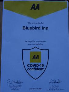 a label for a bluebird inn with a shield at The Bluebird Inn at Samlesbury in Preston