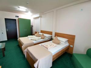 Ein Bett oder Betten in einem Zimmer der Unterkunft Delta Palace
