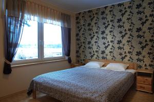 Postel nebo postele na pokoji v ubytování Seedri Guesthouse