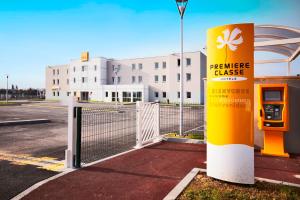 Certificato, attestato, insegna o altro documento esposto da Premiere Classe Caen Nord - Mémorial