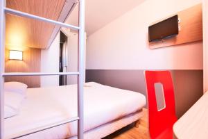 Letto o letti in una camera di Premiere Classe Caen Nord - Mémorial