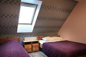 Postel nebo postele na pokoji v ubytování Seedri Guesthouse