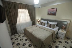 Ένα ή περισσότερα κρεβάτια σε δωμάτιο στο Sumaya Hotel +61 φωτογραφίες