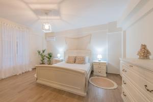 Fotografie z fotogalerie ubytování White Collection Villas & Suites - Pnoe Villa v destinaci Pandokrátor