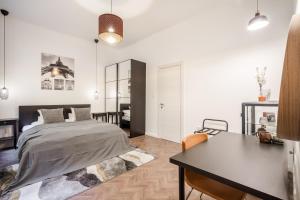 BpR SIRIUS Suite with A/C客房内的一张或多张床位
