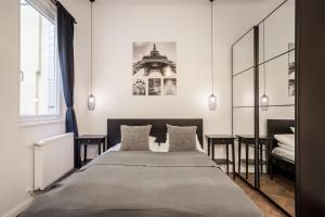 BpR SIRIUS Suite with A/C客房内的一张或多张床位