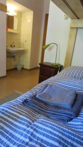 Ein Bett oder Betten in einem Zimmer der Unterkunft Basecamp Apartment