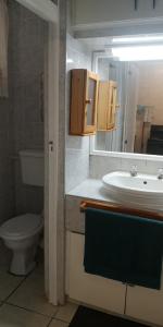 Koupelna v ubytování 106 Umdloti Resort