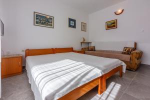 Postel nebo postele na pokoji v ubytování KLARIC