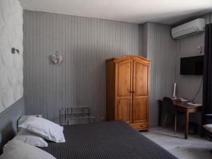 Postel nebo postele na pokoji v ubytování Hotel Beau Rivage