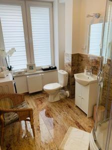 Ένα μπάνιο στο Apartament Walczaka 22 MIEJSCE PARKINGOWE
