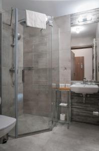 Ванна кімната в Hotel Grey Spa