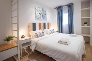 Posteľ alebo postele v izbe v ubytovaní Tendency Apartments 12 Penthouse