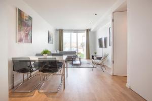 Televízia a/alebo spoločenská miestnosť v ubytovaní Tendency Apartments 12 Penthouse