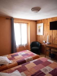 Postel nebo postele na pokoji v ubytování Hotel Beau Rivage