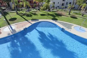 Bazén v ubytování 009 - Residencial Bahía 001 - comfortHOLIDAYS nebo v jeho okolí