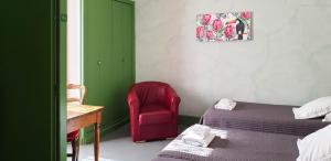 Postel nebo postele na pokoji v ubytování Hotel Beau Rivage
