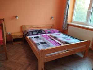 Postel nebo postele na pokoji v ubytování Apartments Klentnice U Mikulova