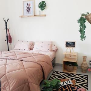 Кровать или кровати в номере Villa Seruni Bandungan