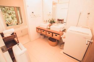 Koupelna v ubytování HALE恩納村 Ys Casa + 29 fotografií
