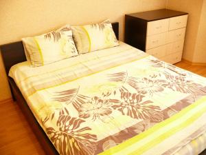 מיטה או מיטות בחדר ב-Osokorky Apartments