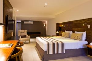 
Cama ou camas em um quarto em Ritz Leblon
