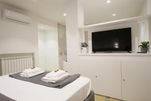 Lova arba lovos apgyvendinimo įstaigoje 7 BLU Casa vacanze con idromassaggio