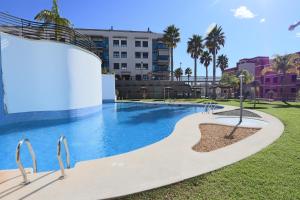 Bazén v ubytovaní 011 - Residencial Bahía 002 - comfortHOLIDAYS alebo v jeho blízkosti