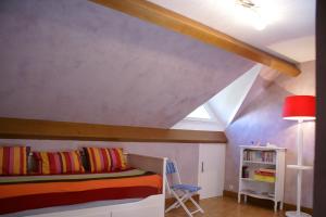Giường trong phòng chung tại Entre Phare et Moulin