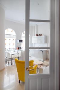 Kuchyňa alebo kuchynka v ubytovaní Hispalis Casa Palacio Apartment