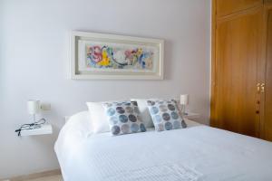 Posteľ alebo postele v izbe v ubytovaní Hispalis Casa Palacio Apartment