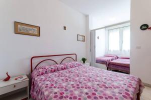 Postel nebo postele na pokoji v ubytování Cortina 1-85