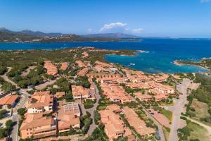 an aerial view of a resort town next to the ocean at Baia de Bahas Residence in Golfo Aranci