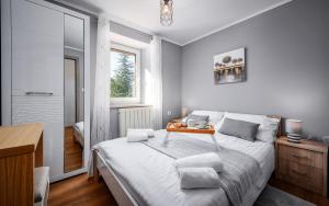 Postel nebo postele na pokoji v ubytování Apartman Giovi