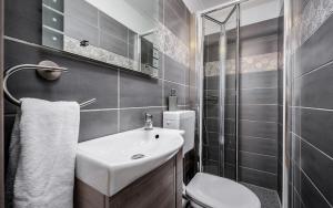 Koupelna v ubytování Apartman Giovi + 30 fotografií