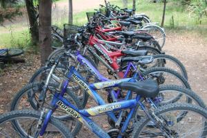 a row of bikes parked next to each other at Canada Hotel & Bungalows in Cıralı