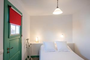 Ένα ή περισσότερα κρεβάτια σε δωμάτιο στο VIVIENDA VACACIONAL DON CRISTÓBAL