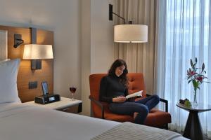 Rúm í herbergi á InterContinental Tegucigalpa at Multiplaza Mall by IHG