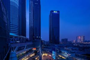 a city skyline at night with tall buildings at Holiday Inn Express Changsha Wuyi Plaza by IHG in Changsha